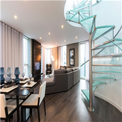 Elegant Glass Spiral Staircase In Mezzanine