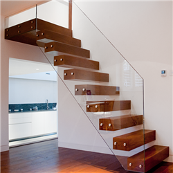 Floating staircase hidden stringer glass railing wood tread